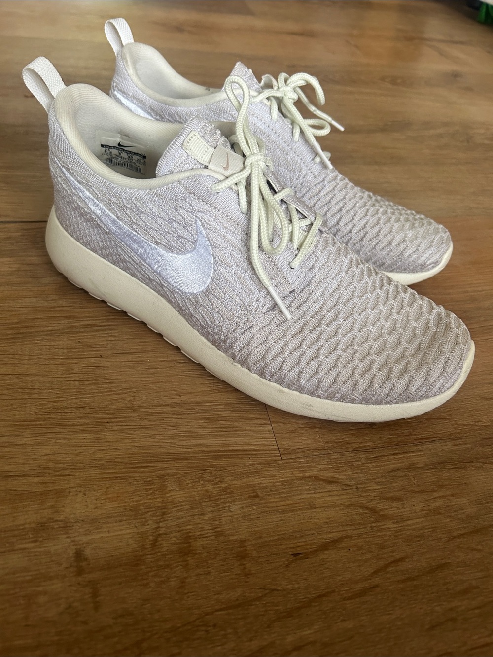 Nike Women’s Light Gray Knit Running Sneakers